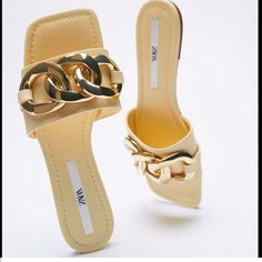 New Zara Chain Trim Heeled Sandal 3614/810 Yellow Gold Size 6.5. Brand New With Tag Chic Chain Sandals For Spring, Chic Gold Sandals With Chain, Chic Gold Sandals With Chain Detail, Chic Gold Sandals With Gold Chain, Spring Chain Sandals With Round Toe, Spring Sandals With Chain Detail And Round Toe, Chic Summer Sandals With Chain, Chic Chain Sandals For Summer, Chic Gold Sandals With Chain Strap