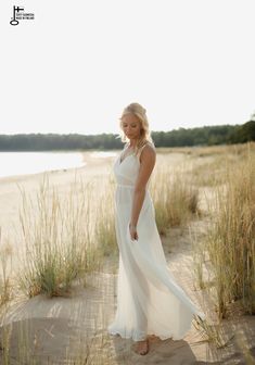 SUNRISE White flowy dress with straps | Maternity dress for photoshoot and wedding | Elopement boho dress for photography |Jenny Aarrekangas SUNRISE is a white flowy romantic dress for photography and boho weddings.  It is the perfect summer dress for maternity photography.  When shooting the maternity dress in backlight, you can see the beautiful silhouette through the fabric. It is also a lovely dress for an elopement photoshoot on the beach or as a boho dress for special occassions. The spagh Flowy Chiffon Maxi Dress For Beach Wedding, Ethereal White Maxi Dress For Wedding, Ethereal White Wedding Maxi Dress, Flowy Maxi Dress For Wedding Night, Flowy Summer Bridesmaid Gown, Ethereal Summer Wedding Gown, Summer Beach Wedding Maxi Gown, Floor-length Gown For Summer Beach Wedding, Summer Beach Wedding Floor-length Gown