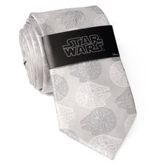 Stylish, silk, and professional with a Star Wars twist, this pewter gray tie will be the talk of the office. The Millennium Falcon is stitched in an alternating white and slate gray pattern, making for a modern yet subtle design. Our tie will maintain its shape and hold a perfect knot thanks to the durable yet soft 100% Silk. Pairs perfectly with any of our matching Millennium Falcon products. Officially licensed by LucasFilm LTD. Millennium Falcon Blueprint, Star Wars Tie, Star Wars Wedding Theme, Batman Gifts, The Millennium Falcon, Tuxedo Studs, Designer Cufflinks, Status Symbol, Pewter Grey