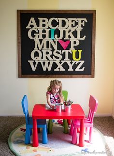 Turn large wooden letters into a huge statement piece with this alphabet art. This would be so cute in my toy room! Large Wooden Letters, Diy Playroom, Alphabet Signs, Alphabet Wall, Daycare Ideas, Diy Spring, Playroom Wall, Alphabet Art