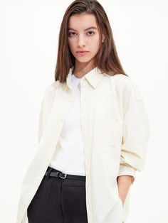 Editor's NotesThis shirt from TRIP LE SENS is made of light and breathable cotton blended fabric. This shirt goes well with every item.- Button closure- Pocket on the chest- Logo embroidery on the pocket- Oversized silhouette- Versatile and unisex itemMeasurements(in.)M/L- Total length: 31.49 / 31.88 in.- Shoulder: 20.47 / 21.25 in.- Chest: 24.01 / 24.80 in.- Sleeve: 24.80 / 25.19 in.Model infoMan -Height: 6'06 Fitting size LWoman - Height: 5'64 Fitting size MComposition & Care- 69% Nylon, 27% Cotton, 4% Polyurethane- Dry cleaning- Do not bleach- Do not tumble dryDesigner- by TRIP LE SENS Oversized Classic Cotton Blouse, Classic Oversized Cotton Blouse, Oversized Cotton Shirt For Daywear, Oversized Cotton Blouse With Placket, Oversized Cotton Shirt With Spread Collar, Everyday Collared Cotton Blouse, Beige Cotton Button-up Shirt, Everyday Cotton Collared Blouse, Everyday Cotton Blouse With Collar