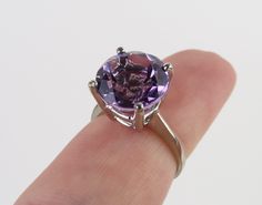 Faceted Purple Amethyst Ring For Formal Occasions, Formal Faceted Purple Amethyst Ring, Formal Faceted Amethyst Ring Fine Jewelry, Formal Amethyst Jewelry With Round Stone, Elegant Faceted Amethyst Ring In Sterling Silver, Elegant Faceted Silver Amethyst Ring, Faceted Purple Amethyst Ring Fine Jewelry, Purple Round Stone Jewelry For Formal Occasions, Fine Jewelry Amethyst Solitaire Ring Round Cut