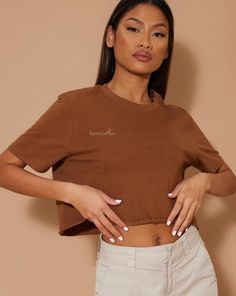 Our new Kem Cropped Tee is made from soft, comfortable fabrics and easy-to-wear silhouettes that feel amazing and go with just about everything. Brown cropped t-shirt Designed to have an oversized fit Raw, distressed hem Drop shoulder Relaxed fit Short sleeves Dry Clean Imported Composition: 100% Cotton Color may vary due to lighting on images Line Shopping, Cropped T Shirt, Cropped Tee, Waist Trainer, Crop Tshirt, Crop Tee, Workout Shorts, Shapewear, Matching Sets