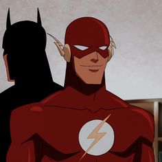 the flash and batman are standing next to each other