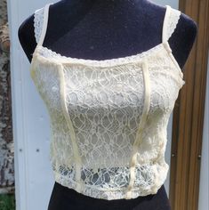 This Item Is Never Worn But I Did Take Off The Tags Lacy Crop Tops, White Fitted Summer Camisole, White Lace Fitted Tank Top, Fitted Cream Tank Top With Lace Trim, Beige Lace Fitted Crop Top, White Lace Tank Top For Spring, Fitted Beige Lace Crop Top, Fitted Lace Beige Crop Top, Fitted Cream Tank Top For Beach