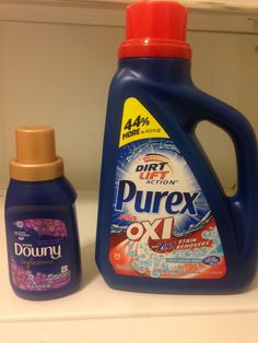 a bottle of purex next to a container of oxi