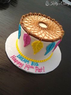 a decorated birthday cake on a table