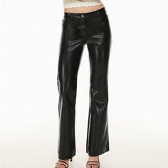 The One, The Only, The Melina. These Are Low-Rise Flared Pants With Five-Pocket Styling And A Universally Flattering Fit. They’re Made With Our Innovative Vegan Leather That Looks And Feels Like The Real Thing. They Have An Authentic Drape And Soft Sheen That Feels Right From Day One. Fitted Wide Leg Leather Pants For Spring, Low Rise Leather Pants, Aritzia Pants, Aritzia Wilfred, Flared Pants, Faux Leather Pants, Flare Pants, Bottoms Pants, Low Rise