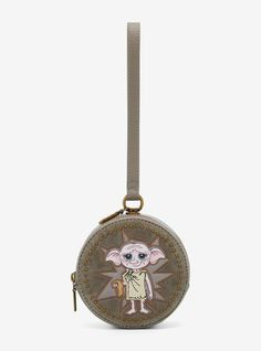 Bring your favorite House Elf on all your adventures with this Harry Potter coin purse! Featuring an embroidered applique of Dobby  the front of this purse also includes velvet details and a studded border. With a zipper closure  wristlet strap  and a lobster clasp  this coin purse is the perfect accessory for Hogsmeade. Don't forget the other matching coin purses sold separately!A BoxLunch Exclusive!PolyurethaneApprox. 5" W x 5" H x 2 34" DImported Harry Potter Coins, Hogwarts Decor, Harry Potter Dobby, House Elf, Dobby Harry Potter, Tee Bag, Embroidered Portrait, Loungefly Bag, Elf House