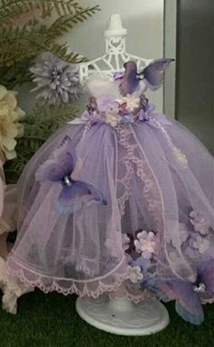 a dress made out of tulle with butterflies on it