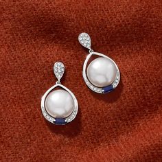 Ross-Simons - 10.5-11mm Cultured Pearl, .30ct t. w. Sapphire Drop Earrings, Diamond Accents. Simply lovely. These shimmery drop earrings feature lustrous 10.5-11mm cultured freshwater button pearls, sparked by .30 ct. t. w. sapphire baguettes and diamond accents. Crafted in luxurious 14kt white gold. Post/clutch, sapphire and white pearl drop earrings. Pearl birthstones are the perfect gift for June birthdays. Elegant Polished Pearl Earrings For Anniversary, Classic White Gold Gemstone Bridal Earrings, Classic White Gold Bridal Earrings With Gemstones, White Diamond Gemstone Earrings For Formal Occasions, White Diamond Earrings For Formal Occasions, Formal White Diamond Gemstone Earrings, Pear-shaped Diamond Pearl Earrings For Anniversary, Anniversary Pearl Earrings With Polished Finish, Silver Platinum Pearl Earrings For Anniversary