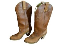 "Vintage brown 70's cowboy boots, Dingo, sz 5.5 M. stacked wood heel, has one blemish on the heel, other than that in good vintage condition, measurements are length 10\" width 3\" heel height 3\" boot height 14\" diameter calf 13\"" Western Brown Boots With Stacked Heel, Country Style Brown Heeled Boots For Rodeo, Fitted Western Brown Heeled Boots, Brown Fitted Western Heeled Boots, Western Style Fitted Brown Heeled Boots, Fitted Brown Western Heeled Boots, Brown Western Heeled Boots For Western-themed Events, Southwestern Style Brown Boots For Western-themed Events, Brown Round Toe Heeled Boots For Rodeo