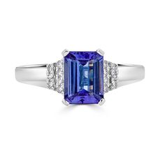 8x6mm Violetish Blue AAAA Tanzanite Ring Emerald Cut shape 1.70 ct with 0.08 cttw Diamond in 14K White Gold. Product Information SKU TT50841/7 Metal Type 14K Metal Color White Gold Ring Style - Primary Stone Gemstone Name Tanzanite Gemstone Species Zoisite No. Of Gemstones 1 Gemstone Shape Emerald Cut Gemstone Weight 1.70 Gemstone Size 8x6 Origin Tanzania Secondary Stone Gemstone Name Diamond Gemstone Species Diamond No. Of Gemstones 14 Gemstone Shape Round Gemstone Weight 0.08 Gemstone Size - O Sapphire Birthstone, Precious Rings, Tanzanite Diamond Ring, Tanzanite Diamond, Ring Emerald, Tanzanite Ring, Tanzanite Gemstone, Ring Style, White Gold Ring