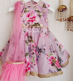 ✨ The gota patti handwork, high-quality material, and fully lined kurta make this dress comfortable and durable, while the baby pink color of the leggings and scarf add a touch of sweetness to the overall look.  ✨ The Floral Print Girls Anarkali dress is a perfect addition to any little girl's wardrobe. It is a stunning three-piece set that includes leggings, a kurta, and a scarf. The baby pink color of the leggings and scarf is perfect for the little princess in your life, and it complements the beautiful floral print on the kurta. The kurta is fully lined, providing a comfortable and stylish fit for your little one. The kurta also features a back zip for easy wear, making it effortless for your child to dress themselves. ✨ The top of the kurta is adorned with gota patti handwork, which a Pink Floral Anarkali, Mommy Daughter Dresses, Floral Anarkali, Kids Party Wear Dresses, Kids Party Wear, Lined Leggings, Baby Pink Colour, Anarkali Kurta, Eid Dresses