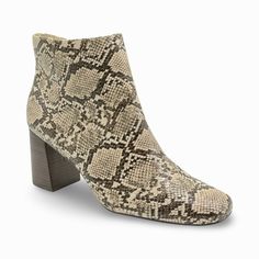 Introducing the Bella Vita Wilma – a fashionable ankle bootie featuring a chic snake print design atop a sturdy block heel. Perfect for adding a fashion statement to any look. Features: - Snake Print Design- Square Toe- Zipper Closure- Heel Type: Block- Heel Height: 2.5"- Shaft Height: 4.5" High Heel Snake Print Boots For Fall, Snake Print High Heel Boots For Fall, Chic Snake Print Boots With Block Heel, Fall Snake Print High Heel Boots, Trendy Snake Print Boots For Spring, Trendy Snake Print Ankle Boots, Chic Snake Print Ankle Boots, Fall Snake Print Ankle Boots, Casual High Heel Snake Print Boots