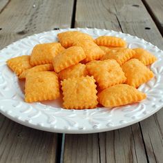 some food that is on a plate on a wooden table and ready to be eaten