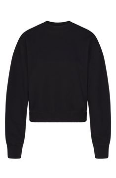 You'll want to lounge all day in this supersoft fleece pullover in a comfy, classic silhouette from Kim Kardashian's SKIMS. 22" length (size medium) Crewneck Long sleeves 70% cotton, 30% polyester Machine wash, dry flat Imported Fall Crew Cropped Sweater With Ribbed Cuffs, Fall Cropped Crew Sweater With Ribbed Cuffs, Black Cropped Crew Neck Sweater With Ribbed Cuffs, Black Crew Neck Cropped Sweater With Ribbed Cuffs, Cozy Cropped Sweater With Crew Neck And Ribbed Cuffs, Sporty Black Cropped Sweater For Streetwear, Cozy Fleece Sweats With Ribbed Waistband, Oversized Cropped Sweater With Ribbed Crew Neck, Oversized Cropped Sweater With Ribbed Collar