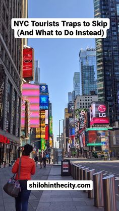 a woman is walking down the street in new york, with neon signs and buildings behind her