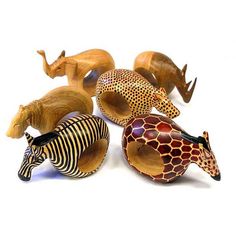 several different animal figurines sitting on top of each other