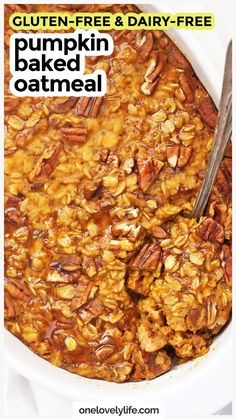 a bowl filled with pumpkin baked oatmeal and topped with pecans on top