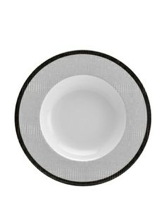 a white plate with black trim around it