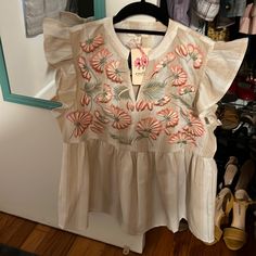 Adorable Pink And Cream Blouse From Entro With Floral Detail. Chic Embroidered Ruffle Top For Spring, Chic Embroidered Ruffled Top For Spring, Chic Embroidered Top With Ruffles For Spring, Floral Embroidered Short Sleeve Tops For Brunch, Chic Embroidered Tops For Vacation, Chic Embroidered Top For Spring Brunch, Floral Embroidered Short Sleeve Top For Day Out, Day Out Floral Embroidered Short Sleeve Top, Embroidered Short Sleeve Blouse For Brunch