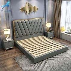 a bedroom with blue walls and wooden flooring has a bed frame made out of wood