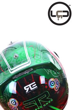 the helmet is designed to look like it has been painted with green and red designs