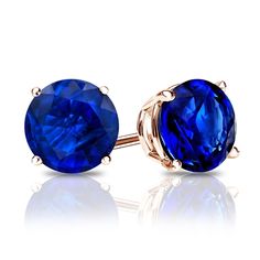 This gorgeous style of round blue sapphire gemstone stud earrings that holds an approximate total weight of 0.25 ct. comes in a 14k rose gold 4-prong basket setting with a choice of push-back or lever back clasps. Diy Jewelry Storage, Blue Gift Ideas, Gown For Wedding, Princess Cut Stud Earrings, K Dot, Sapphire Earring, Black Diamond Pendant, Blue Everything, Blue Sapphire Studs