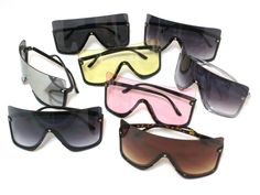 These shield style sunglasses offer 100% UV protection, half plastic frames  and multi color shield one piece lenses. Have molded nose pads. Great for any kind of outdoor activities  and for safety purposes. Free shipping in the United States. Rimless Shield Sunglasses With Tinted Lenses, Rimless Tinted Shield Sunglasses, Rimless Polycarbonate Shield Sunglasses With Uv Protection, Rimless Plastic Shield Sunglasses With Tinted Lenses, Trendy Plastic Shield Sunglasses For Outdoor, Rimless Plastic Shield Sunglasses With Gradient Lenses, Rimless Shield Sunglasses With Gradient Lenses For Outdoor, Multicolor Shield Sunglasses With Uva Protection For Beach, Trendy Multicolor Anti-reflective Shield Sunglasses