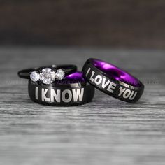 two wedding rings with i love you and i know things written on the inside of them