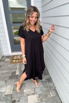 Wait until you feel how buttery soft this maxi dress is. Features a v-neckline, side slits and pockets. Model is 5'3" wearing a small 94% poly 6% Spandex hand wash or dry clean made in the USA! Black V-neck Midi Dress With Side Slits, Black V-neck Maxi Dress With Side Slits, Black V-neck Midi Dress For Loungewear, Solid V-neck Dresses With Side Slits, V-neck Loungewear Dress With Side Slits, Everyday V-neck Summer Dresses, Casual V-neck Dress For Everyday, Sweet Grace, Graphic Tee Dress