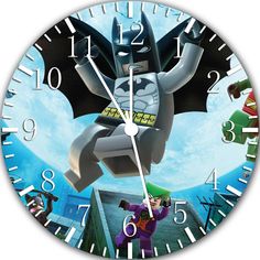 a clock with the image of batman flying through the sky