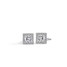 This pair of diamond studs has been carefully matched in size. I/J color and VVS clarity ensures that these near colorless diamonds are free from any visible inclusions to the unassisted eye. These center diamonds weigh 1.050 carats total weight and 1.04 carats total weight each for a total combined of 2.09 carats and are surrounded by an additional 0.31 carats total weight of diamonds. J.R. Dunn has a lifetime 100% trade up policy. Trade in value must be 25% higher than original purchase. If yo Classic Rectangular Brilliant Cut Diamond Bracelet, Classic Rectangular Diamond Bracelet With Brilliant Cut, Classic Brilliant Cut Diamond Bracelet, Emerald Cut Diamond Bracelet With Accents For Anniversary, Classic Emerald Cut Diamond Bracelet For Weddings, Timeless Square Cut Diamond Jewelry, Elegant Octagon Diamond Bracelet For Formal Occasions, Classic Emerald Cut Diamond Bracelet With Accents, Elegant Octagon Diamond Bracelet