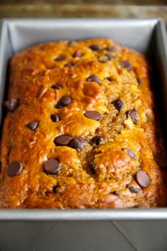 a loaf of chocolate chip banana bread in a pan