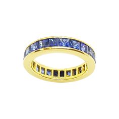 Blue Sapphire 4.28 carats Eternity Ring set in 18 Karat Gold Settings Diameter: 1.5 cm Length: 0.4 cm Ring Size: 51 Total Weight: 4.85 grams "We first opened doors in 1980 when it was then situated in the vicinity of the Victory Monument; a small and modest storefront with a couple of counters. From its humble beginnings to where it stands today, our company has proven its abilities as a jeweler. Since the beginning, we have been supplying fine quality pieces to dealers, wholesalers and customer Luxury Yellow Gold Sapphire Ring Channel Set, Luxury Eternity Band With Baguette Cut Gemstone, Luxury Gemstone Baguette Cut Eternity Band, Luxury Baguette Cut Gemstone Eternity Band, Luxury Gemstone Eternity Band For Anniversary, Luxury Sapphire Channel Set Ring, Luxury Sapphire Rings Channel Set, Luxury Blue Rings With Channel Set, Classic Gemstone Eternity Band