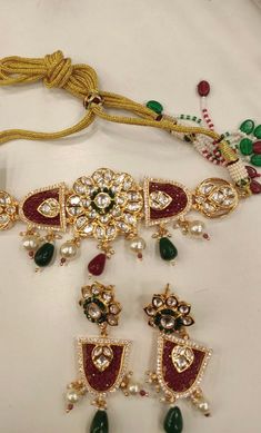 One of our favorite picks for the wedding season 2022♥️ The gorgeous choker is beautifully handcrafted by our skilled Indian craftsmen in Kundan stones, multi coloured beads, mini pearls, and gold plated. The beautiful Kundan earrings add to the traditional ethnicity of the piece. Material: Brass with gold plating Length of earrings: 6.5 cms Width of earrings: 2 cms Chandbali Shaped Jeweled Jewelry Gift, Handmade Multicolor Gold-plated Jewelry, Temple Jewelry Style Gold Plated Choker, Gold Plated Temple Jewelry Choker As Gift, Bollywood Jeweled Jewelry Gift, Adjustable Bridal Necklace For Festive Occasions, Fusion Style Choker For Celebration And Festivals, Fusion Style Choker For Wedding And Festivals, Fusion Style Wedding Choker For Festivals