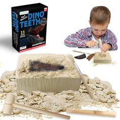 a young boy is making a dinosaur teeth out of dirt and sand with tools to make it look like he's digging in the ground