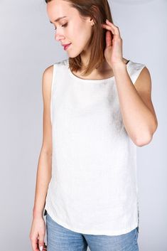 "This linen shirt is made of 100% natural, good quality and stonewashed linen fabric. Organic, natural, vegan, eco friendly.  Please refer to the measurements tables for size. The table shows the size of the actual linen shirt. Linen is not an elastic fabric. If you are unsure of the size you need, please ask me, I'm happy to help. Fabric: Safe Oeko-TEX® standard 100 certified linen fabric, stonewashed. CARE INSTRUCTIONS: - Wash with water temperature 40 o C, - Straightening and hang to dry, - It will become softer with each washing, - Iron upside down (for best results iron with lots of steam). - Linen is a very durable, strong fabric, and one of the few that are stronger wet than dry. The fibres do not stretch, and are resistant to damage from abrasion. Since these are handmade garments, White Linen Tops For Spring, White Ramie Top For Spring, White Relaxed Fit Linen Dress, White Linen Dress With Relaxed Fit, Everyday White Linen Top, Minimalist Linen Summer Tops, Minimalist Linen Tops For Summer, Relaxed Fit Linen Tops, Simple White Linen Top