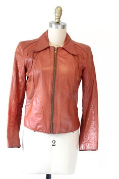 "COOL VINTAGE BROWN LEATHER JACKET. LABEL - CRAC CARIYLC SAN FRANCISCO MADE IN TAIWAN      CHECK MEASUREMENTS. ZIPPER VERY GOOD CONDITION. SHOWS LIGHT GENERAL WEAR HAS ORIGINAL ZIPPER AND LINING. SIZING: (when laid flat) SHOULDER TO SHOULDER: 15\" BUST: 17\" BOTTOM: 15 1/2\" SLEEVE LENGTH: 21 1/8\" SLEEVE OPENING: 4 1/2\" POCKET OPENING: 5\" TOP TO BOTTOM LENGTH (FROM COLLAR FOLD): 22 1/2\" WAIST: 16\"" Vintage Long Sleeve Leather Jacket For Fall, Vintage Leather Jacket With Long Sleeves For Fall, Vintage Spring Outerwear With Zipper Closure, Spring Retro Leather Jacket With Zipper Closure, Spring Retro Leather Jacket With Zipper, Fall Fitted Vintage Brown Leather Jacket, Fitted Vintage Brown Leather Jacket For Fall, Vintage Brown Fitted Leather Jacket For Fall, Vintage Brown Leather Jacket For Fall