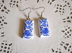 "Expressive blue earrings made of wood with a hand painted look smart and stylish. Earrings are made of alder, size rectangles of 3*1,5 cm., (1,2*0,6 inches). Weight pair just a few grams. Earrings decorated with beautiful drawings in the folk style \" Gzhel \". Painted with tempera paint and securely covered with a protective varnish. I can custom fabricate and other Jewelry of wood with the same design to order. Used Medical steel fittings, very comfortable! Earrings will be sent with silicone Hand Painted Rectangular Earrings Gift, Boho Earrings Wedding, Wedding Blue And White, Folk Art Jewelry, Valentines Gift Ideas, Paisley Earrings, Dark Blue Earrings, Staple Earrings, Boho Wedding Earrings