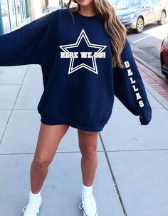 Elevate your game day style with our Dallas Hoodie, a must-have for die-hard fans who bleed blue and silver! Crafted with passion and designed for ultimate comfort, this hoodie is your ticket to showcasing Cowboys pride with flair. Adjustable drawstring hood to keep you snug during chilly games. 🏆 Unmatched Quality: Our hoodies are made to stand the test of time, combining style with durability. The detailed craftsmanship ensures this piece is not just a fan favorite but also a lasting part of your Cowboys memorabilia. 🎁 Perfect Gift for Fans: Surprise the Dallas enthusiast in your life with a gift that's as stylish as it is meaningful. Whether it's game day or a casual outing, this hoodie is a statement piece for every Dallas supporter. 👕 Sizing Information: Available in a range of siz Game Day Team Spirit Long Sleeve Hoodie, Team Spirit Long Sleeve Hoodie For Game Day, Game Day Sports Fan Long Sleeve Hoodie, Blue Sweatshirt For Game Day With School Spirit, School Spirit Hoodie For Game Day With Crew Neck, Long Sleeve Hoodie With Team Name For Game Day, Game Day Fan Apparel Hoodie With Long Sleeves, Game Day Long Sleeve Fan Apparel Hoodie, Oversized Sweatshirt For Game Day And Sports Season