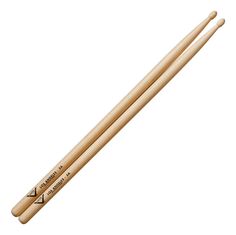 two wooden drumsticks sitting on top of each other