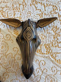 "This is an authentic wooden mask carving of a ZEBRA face recently purchased in Kenya, Africa. It is hand carved from wood and about 8\" tall x 8\" wide ear to ear. We are a US seller, so our shipping is fast and FREE within the US.  There is just something about Africa that seeps into your soul and stays with you. If you are looking for a unique cultural piece of Africa, a gift for a zebra collector, or a one-of-a-kind gift for someone who loves Africa, this beautiful handmade zebra mask will m Zebra Mask, African Wood Carvings, Zebra Face, Animal Face Mask, Wooden Mask, Humanitarian Work, Zebra Animal, Zebras Animal, Animal Faces