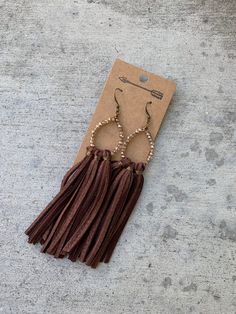 These lightweight tassel fringe earrings are hand designed, meticulously hand cut very fine for a very soft flowing fringe feel. These statement yet staple earrings are simple yet bold for the most versatile wear! You will get compliments everywhere you wear them! Made out of hand cut deerskin leather and faceted crystal, or natural stones. These free spirited fringe earrings are perfect for any occasion dressed up or paired with T-shirt and jeans. Leather earrings are very light on your ears, s Leather Tassel Earrings, Staple Earrings, Gold Crystals, Accessory Ideas, Deer Skin, Tassel Fringe, Free Spirited, Leather Tassel, Fringe Earrings