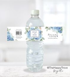 water bottle label with blue hydrangeas and greenery on the side for wedding favors