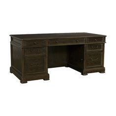 an executive desk with two drawers and one file cabinet on the left side, in dark wood