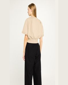 3.1 Phillip Lim cropped sweatshirt     Stand collar; split V neckline     Dropped shoulders     Short cuffed sleeves    Blouson fit    Pullover style    Cotton    Dry clean    Imported Chic Cropped T-shirt For Spring, Oversized Cropped T-shirt For Spring, Oversized Cropped Hem Crop Top For Spring, Oversized Spring Crop Top With Cropped Hem, Oversized Crop Top With Cropped Hem For Spring, V-neck Cropped Sweater With Ribbed Cuffs For Spring, Cropped Top With Ribbed Cuffs, Spring Workwear Tops With Cropped Hem, Spring Cropped Top With Ribbed Cuffs