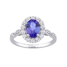 You'll love the elegant style of this Stella Grace tanzanite and white topaz ring. Made from polished 10k white gold, it complements your wardrobe beautifully. You'll love the elegant style of this Stella Grace tanzanite and white topaz ring. Made from polished 10k white gold, it complements your wardrobe beautifully.Click on this JEWELRY & WATCHES GUIDE to learn about fit, styles, materials and more! Metal: 14k white gold Plating: rhodium Packaging: boxed Width: 12.3 mm Finish: polishedSTONE DE Tanzanite Rings With Diamond Accents In Round Cut, Tanzanite Rings With Diamond Accents Round Cut, Classic Tanzanite Diamond Ring In White Gold, Tanzanite White Gold Diamond Ring With Brilliant Cut, White Gold Tanzanite Diamond Ring With Brilliant Cut, Brilliant Cut Tanzanite Diamond Ring In White Gold, Elegant Tanzanite Birthstone Ring For Promise, Elegant Tanzanite Diamond Ring With Prong Setting, Elegant Tanzanite Diamond Ring With Brilliant Cut