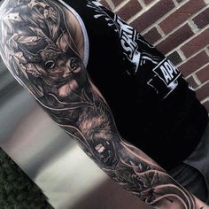 a man with a tattoo on his arm